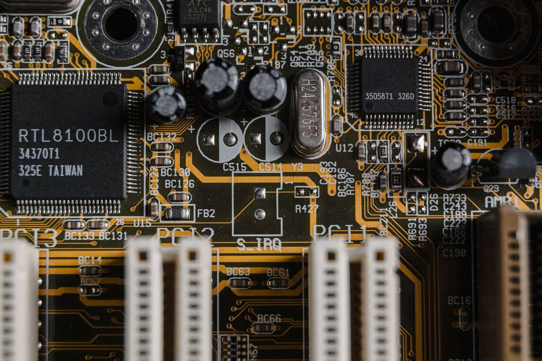 A circuit board - the model-access layer between AI supply and demand is consolidating fast.