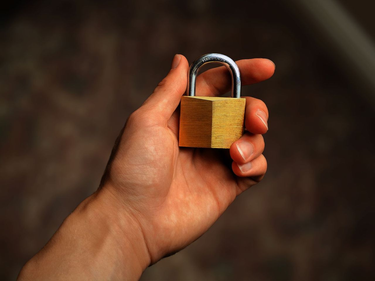 Smartphone with biometric authentication prompt, the local step that unlocks a passkey
